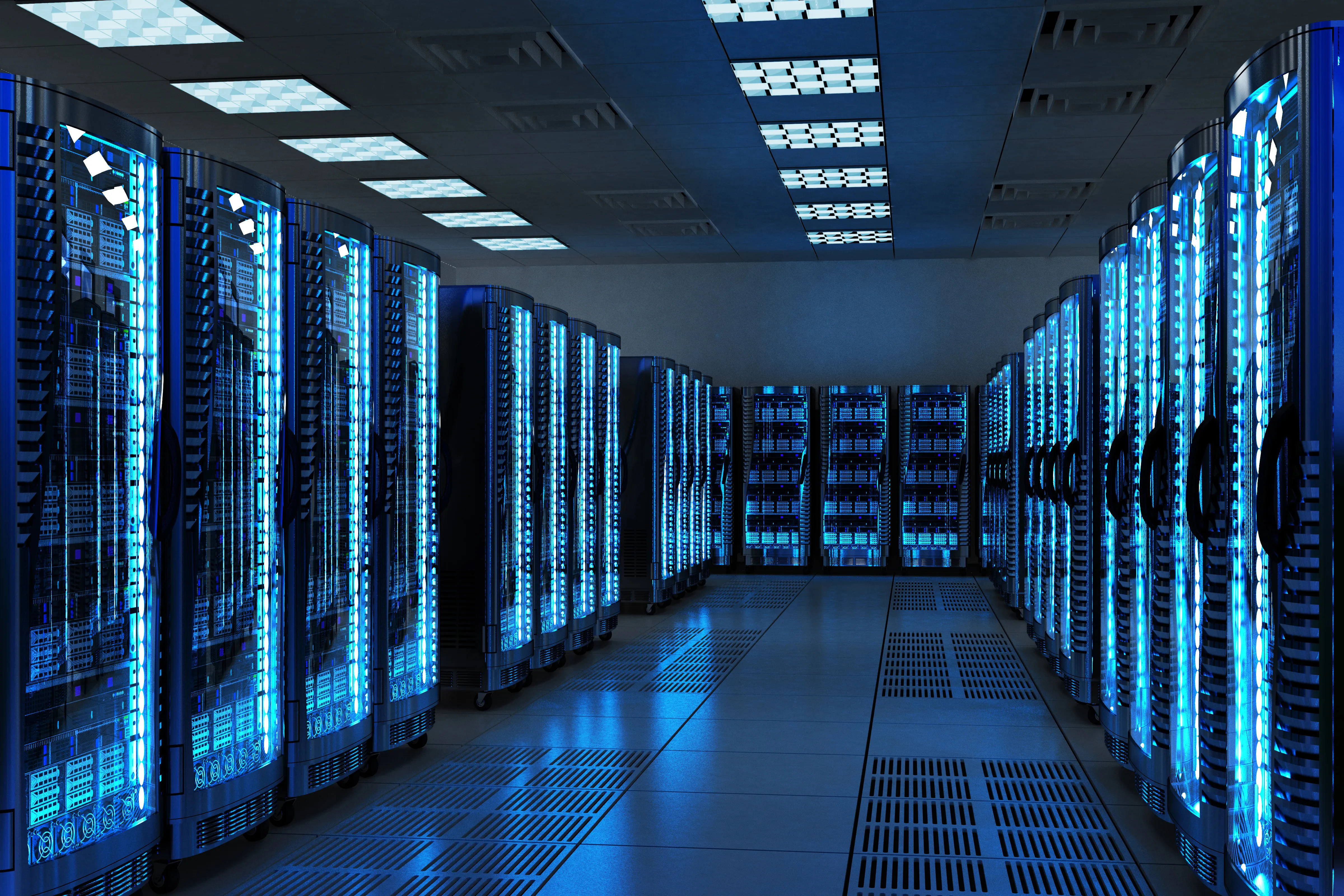 Your Data is Your Business racks of computers in a data center with blue lighting